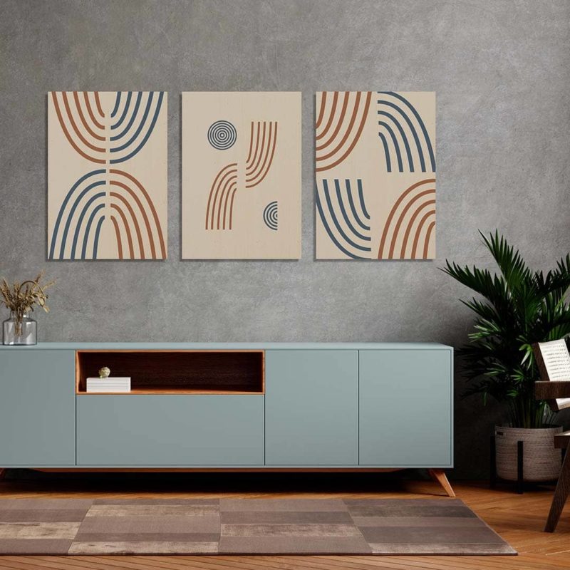 Ambiente de salón con los tres cuadros de madera de la serie Move