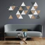 Ambiente sofá triángulos decorativos Tri Marcotte